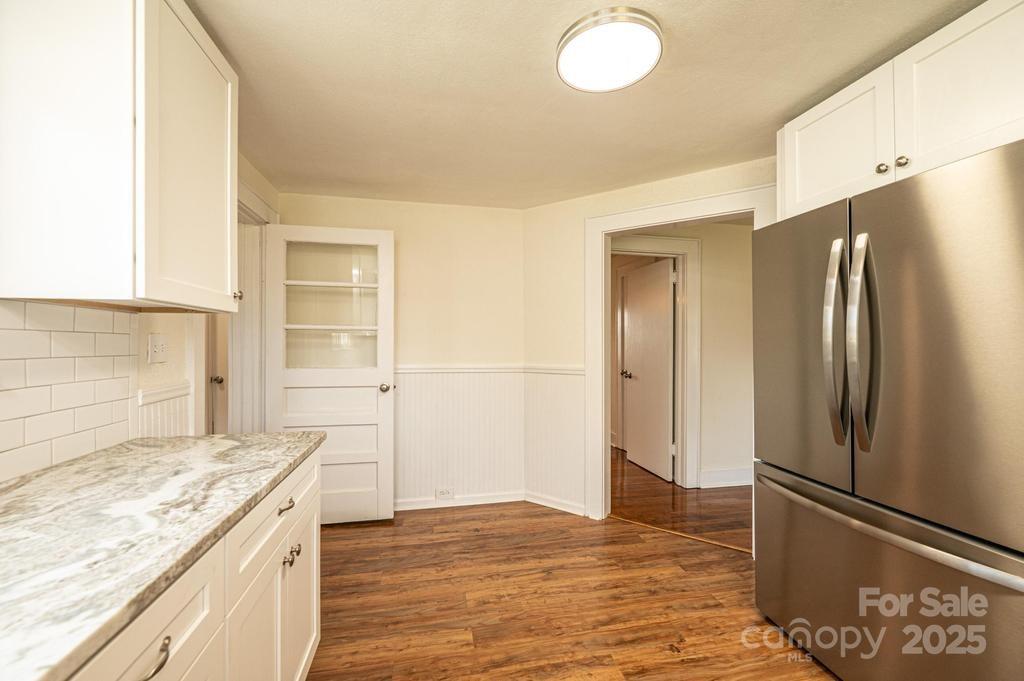 1993 Moss Farm Road Hickory, NC 28602 - Photo 19 of 41 a kitchen with stainless steel appliances granite countertop a refrigerator and a stove