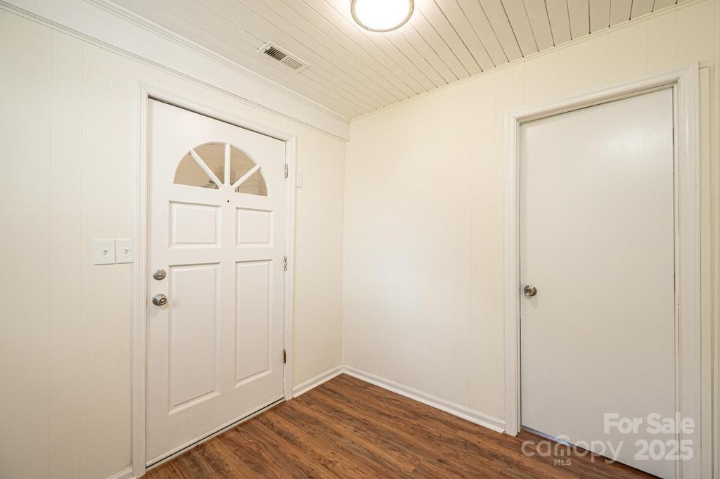 1993 Moss Farm Road Hickory, NC 28602 - Photo 22 of 41 a view of empty room with wooden floor