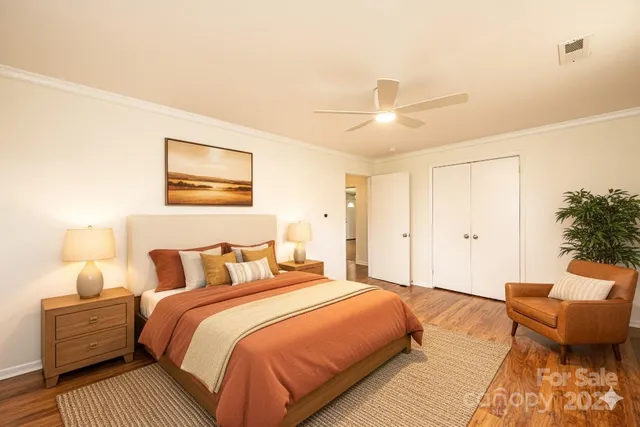 a bedroom with bed and window