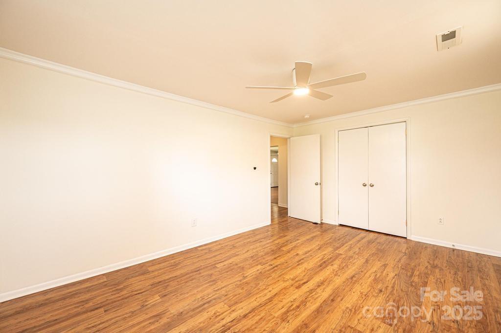 1993 Moss Farm Road Hickory, NC 28602 - Photo 24 of 41 a view of empty room with wooden floor