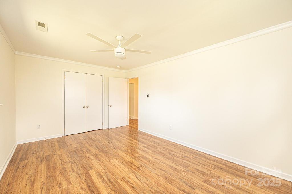 1993 Moss Farm Road Hickory, NC 28602 - Photo 26 of 41 a view of empty room with wooden floor