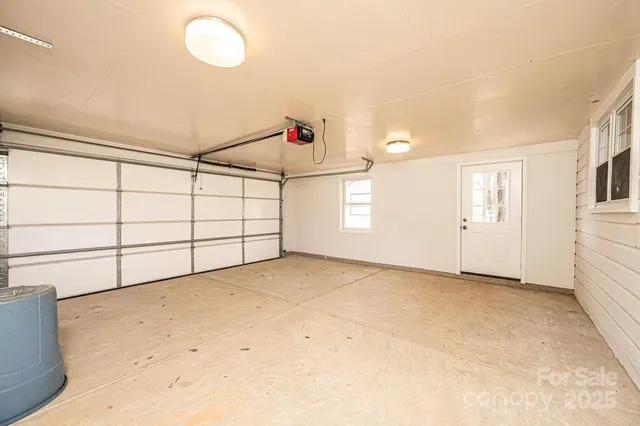 a view of a storage & utility room with a sink