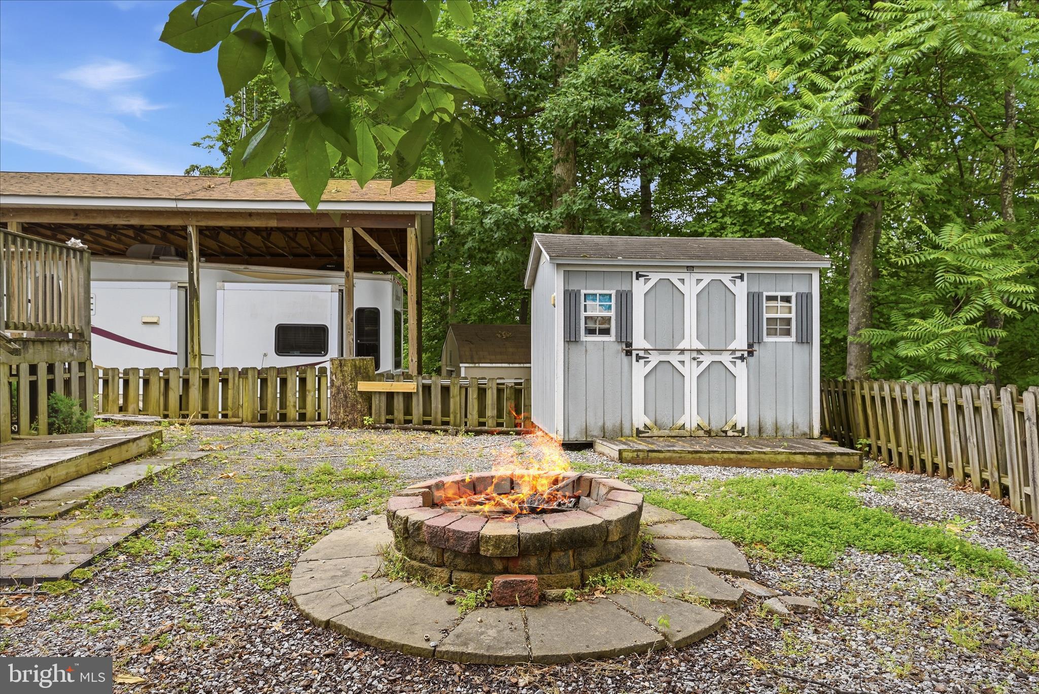 Lot 20 Hot Dog Road Falling Waters, WV 25419 - Photo 18 of 26 a view of a house with backyard and porch