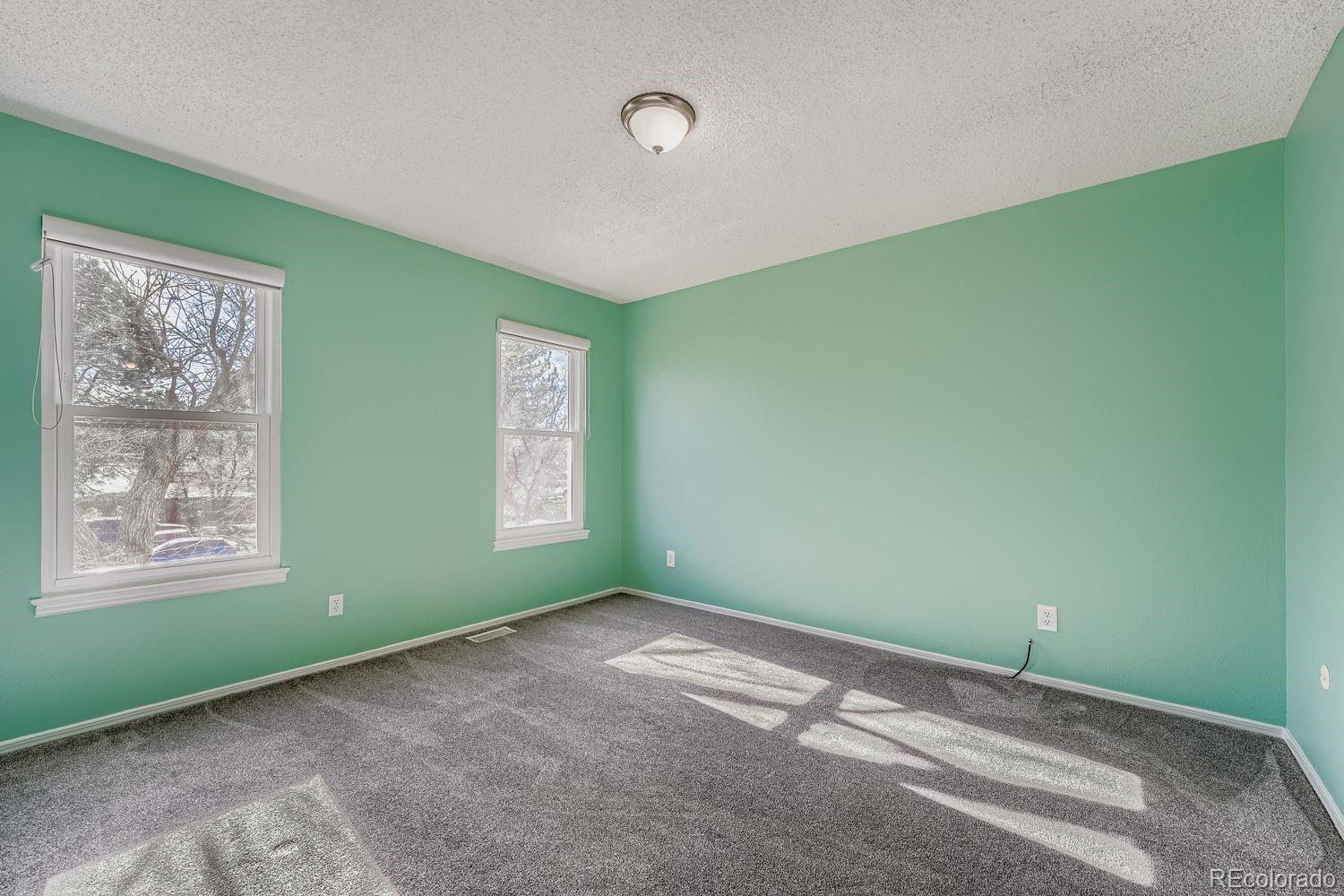 2204 South Jasper Way, Unit B Aurora, CO 80013 - Photo 12 of 19 a view of room with window