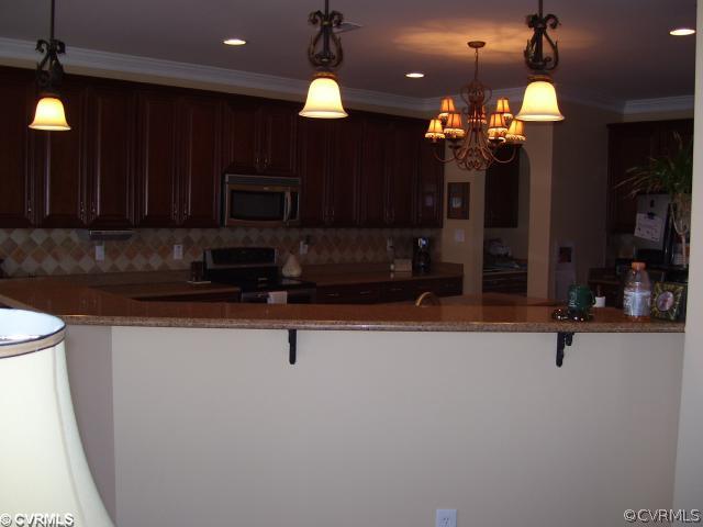 2113 Tomahawk Ridge Place Midlothian, VA 23112 - Photo 3 of 10 Exterior Front - LOTS of Cabinet space! Upgraded f