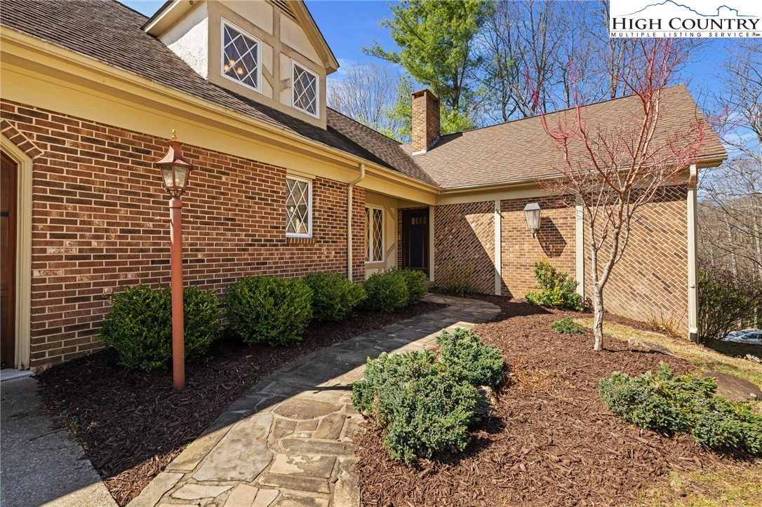 304 Glendale Drive Boone, NC 28607 - Photo 14 of 50 a view of a house with a backyard
