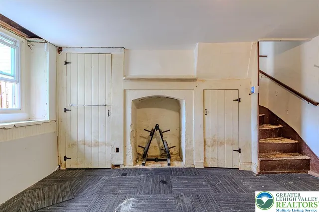 a view of entryway with wooden floor