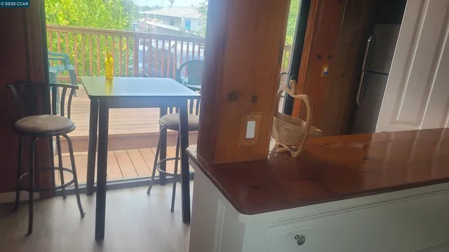 a view of a livingroom with furniture and window