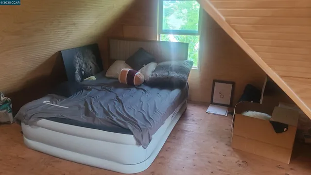 a kitchen with stainless steel appliances a sink and a stove