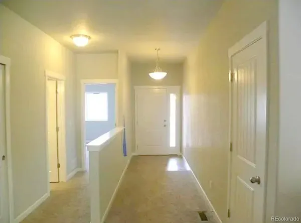 a view of entryway with bathroom