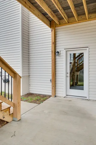 a view of a big room with wooden walls