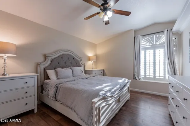 a kitchen with stainless steel appliances kitchen island granite countertop a refrigerator and a stove top oven