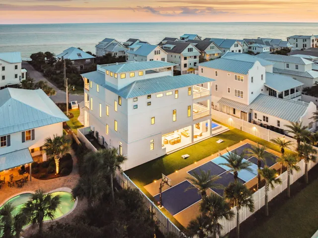 a view of a balcony with yard