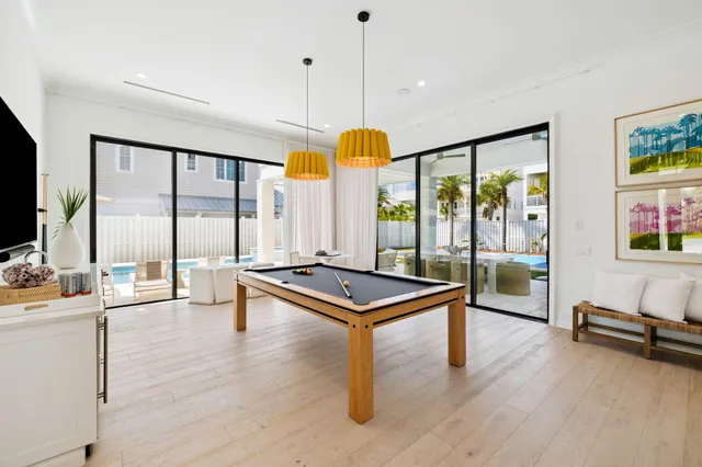 a living room with a table or chairs and a wooden floor
