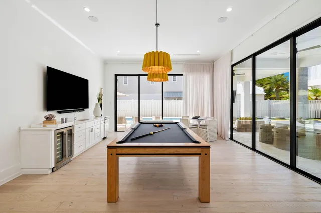 a view of a porch with furniture and garden