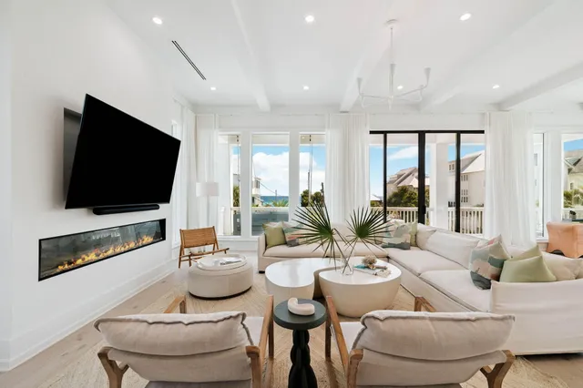 a view of living room with furniture and flat screen tv