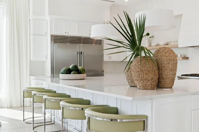 a bathroom with a shower sink vanity mirror and toilet