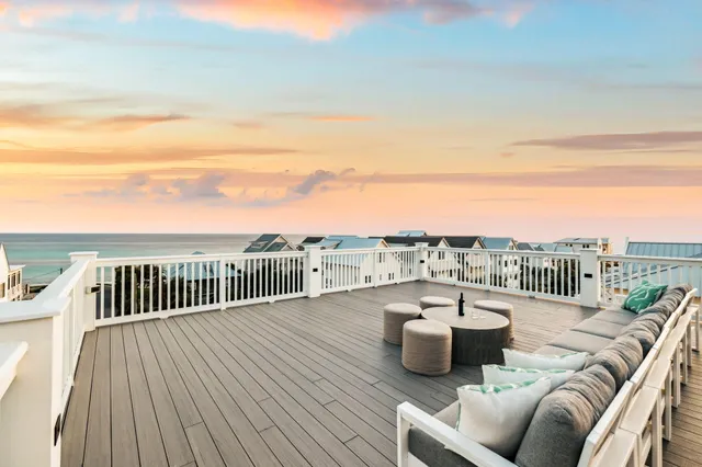 a bedroom with a bed tv and window