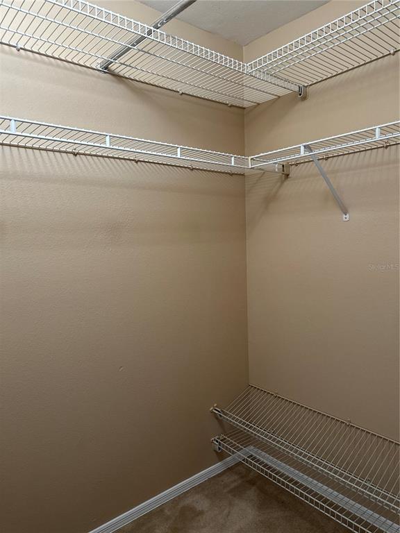 420 Summit Ridge Place, Unit 316 Longwood, FL 32779 - Photo 16 of 19 a view of a room with racks on the wall