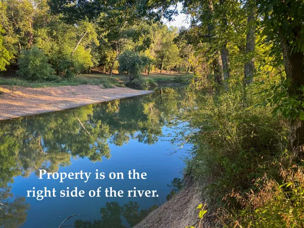 a view of a back yard of the house and a garden