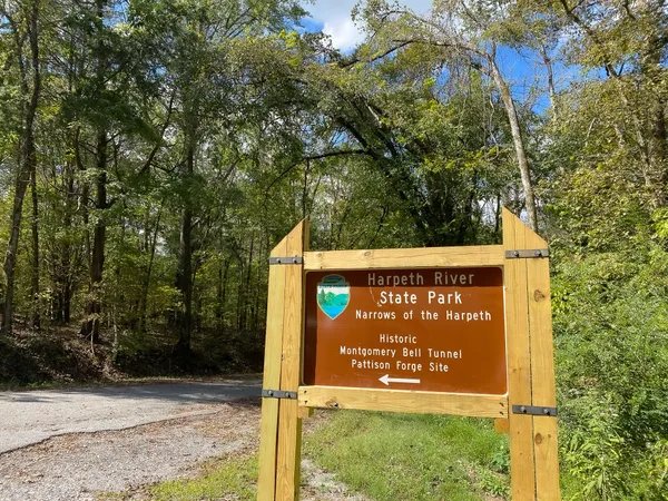 a sign on the side of the road