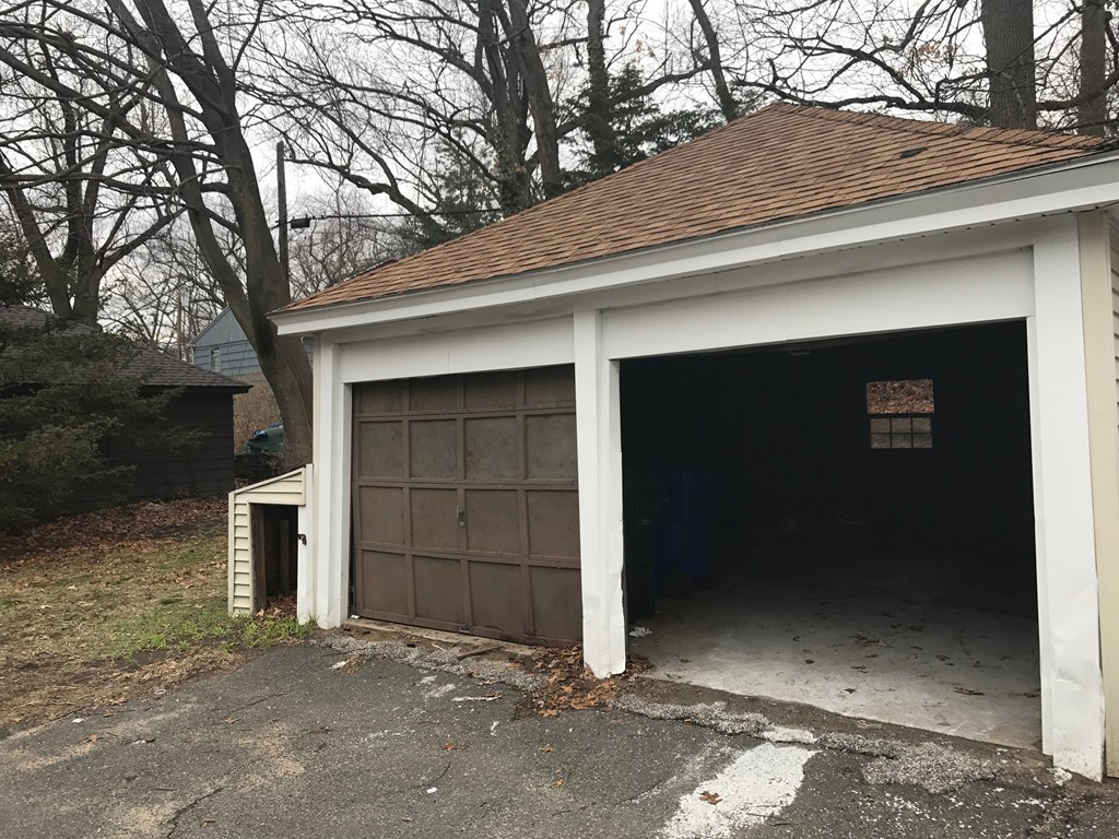 606 Alden Street Springfield, MA 01109 - Photo 21 of 22 a small white house with a outdoor space