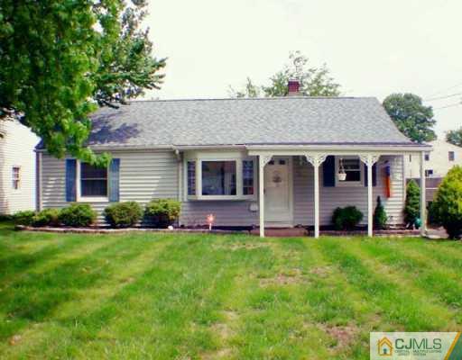 34 South Hill Road Colonia, NJ 07067 - Photo 1 of 8 a view of a house with a yard and potted plants