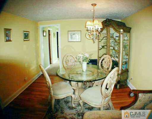 34 South Hill Road Colonia, NJ 07067 - Photo 3 of 8 a dining room with furniture and window