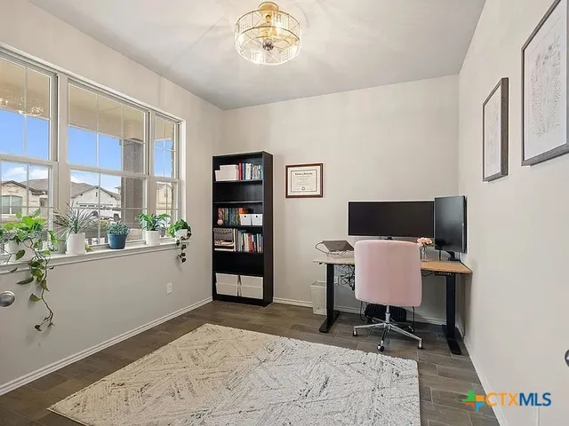 a bedroom with furniture and a bed