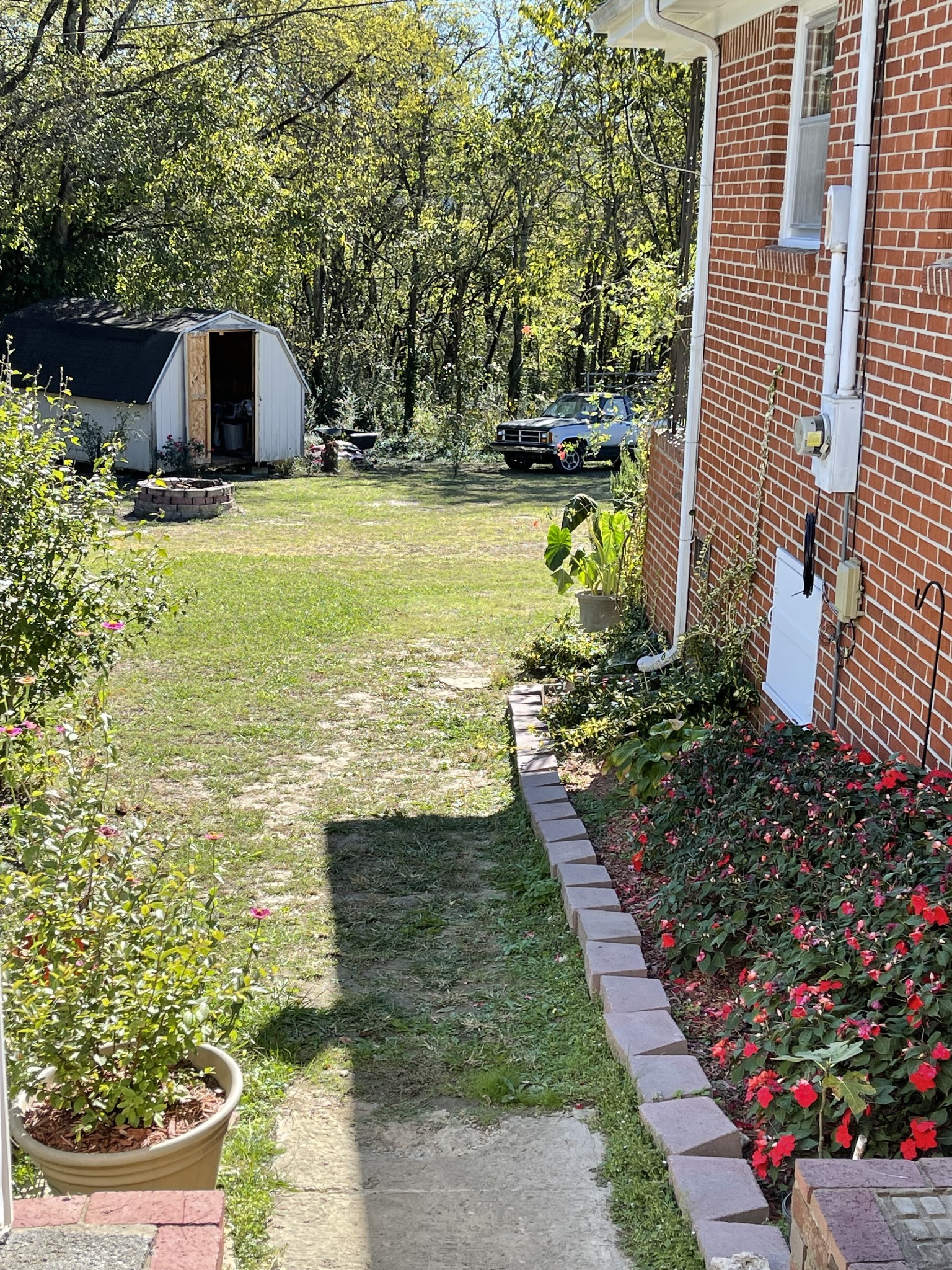 21 Cedar Lane Mulberry, TN 37359 - Photo 18 of 22 a view of a backyard with potted plants