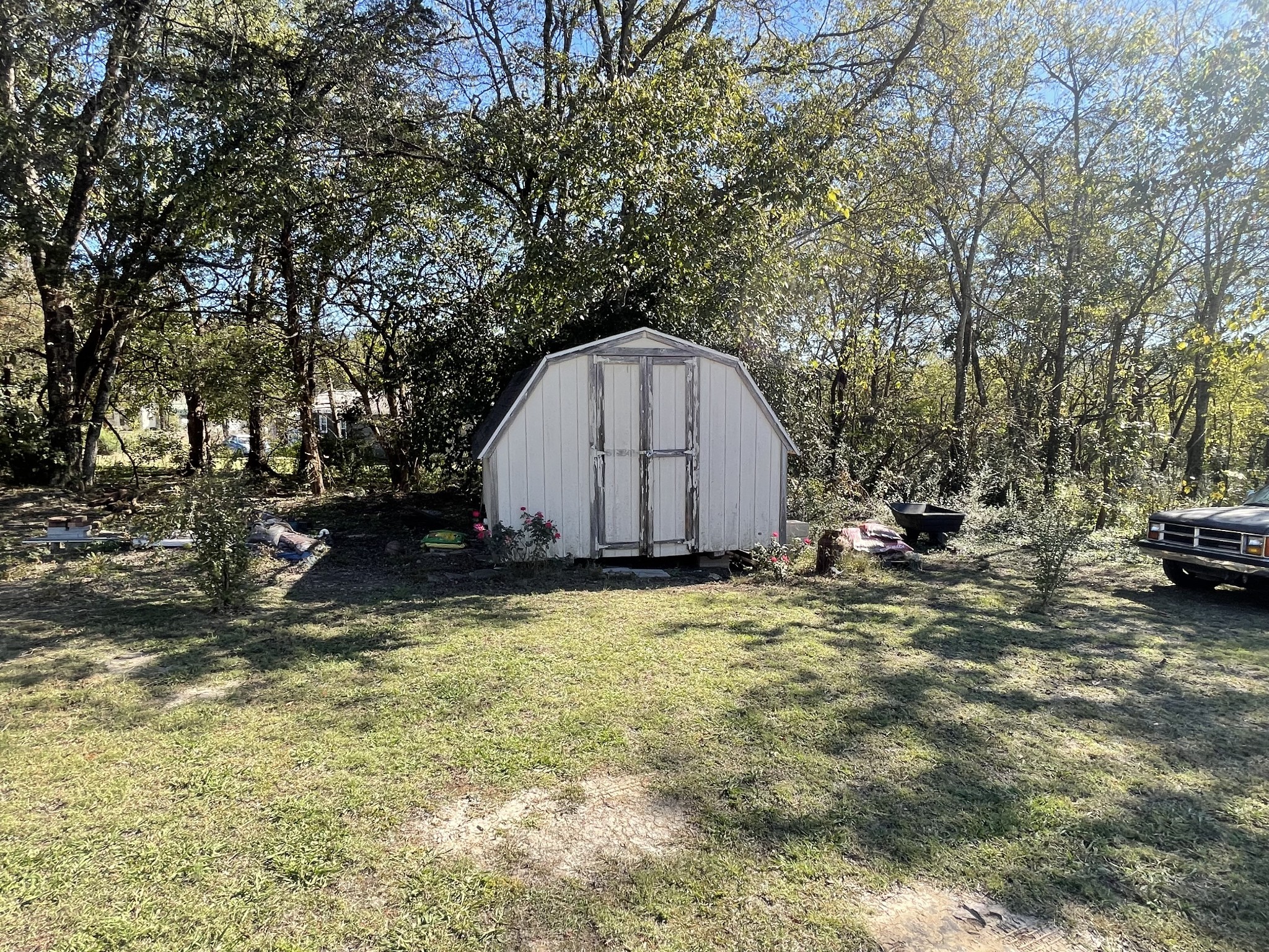 21 Cedar Lane Mulberry, TN 37359 - Photo 20 of 22 a view of backyard with table and chairs and a large tree