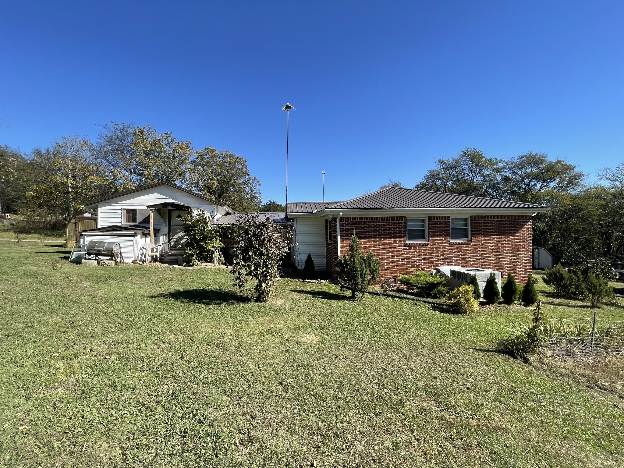 21 Cedar Lane Mulberry, TN 37359 - Photo 4 of 22 a front view of a house with a yard