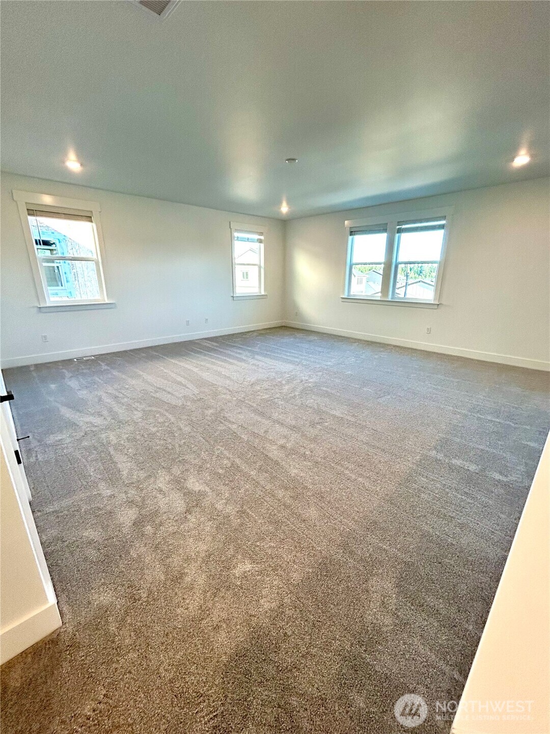 6034 Trce Drive Southwest Port Orchard, WA 98367 - Photo 15 of 40 an empty room with windows