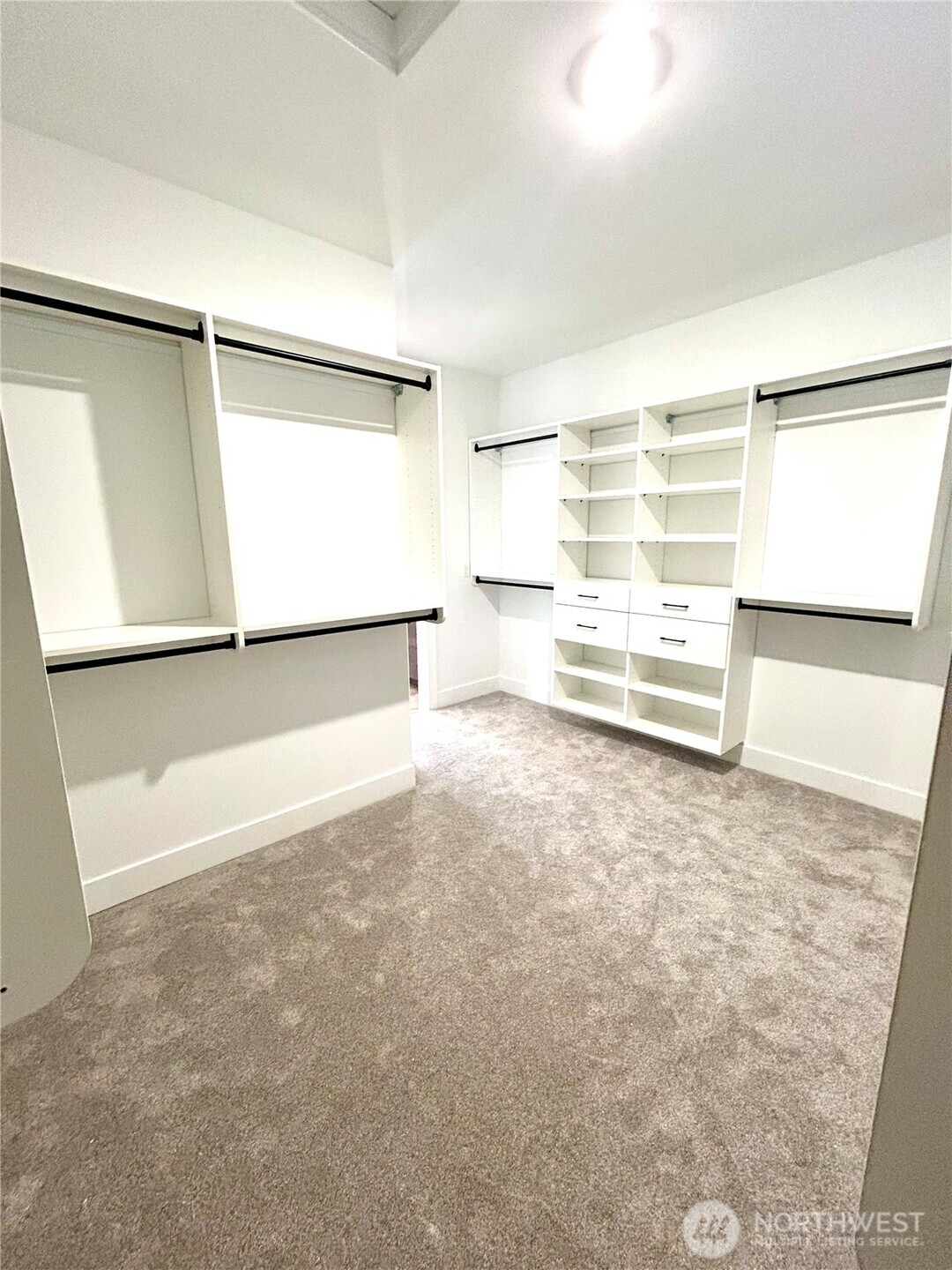 6034 Trce Drive Southwest Port Orchard, WA 98367 - Photo 22 of 40 an empty room with wooden floor and windows