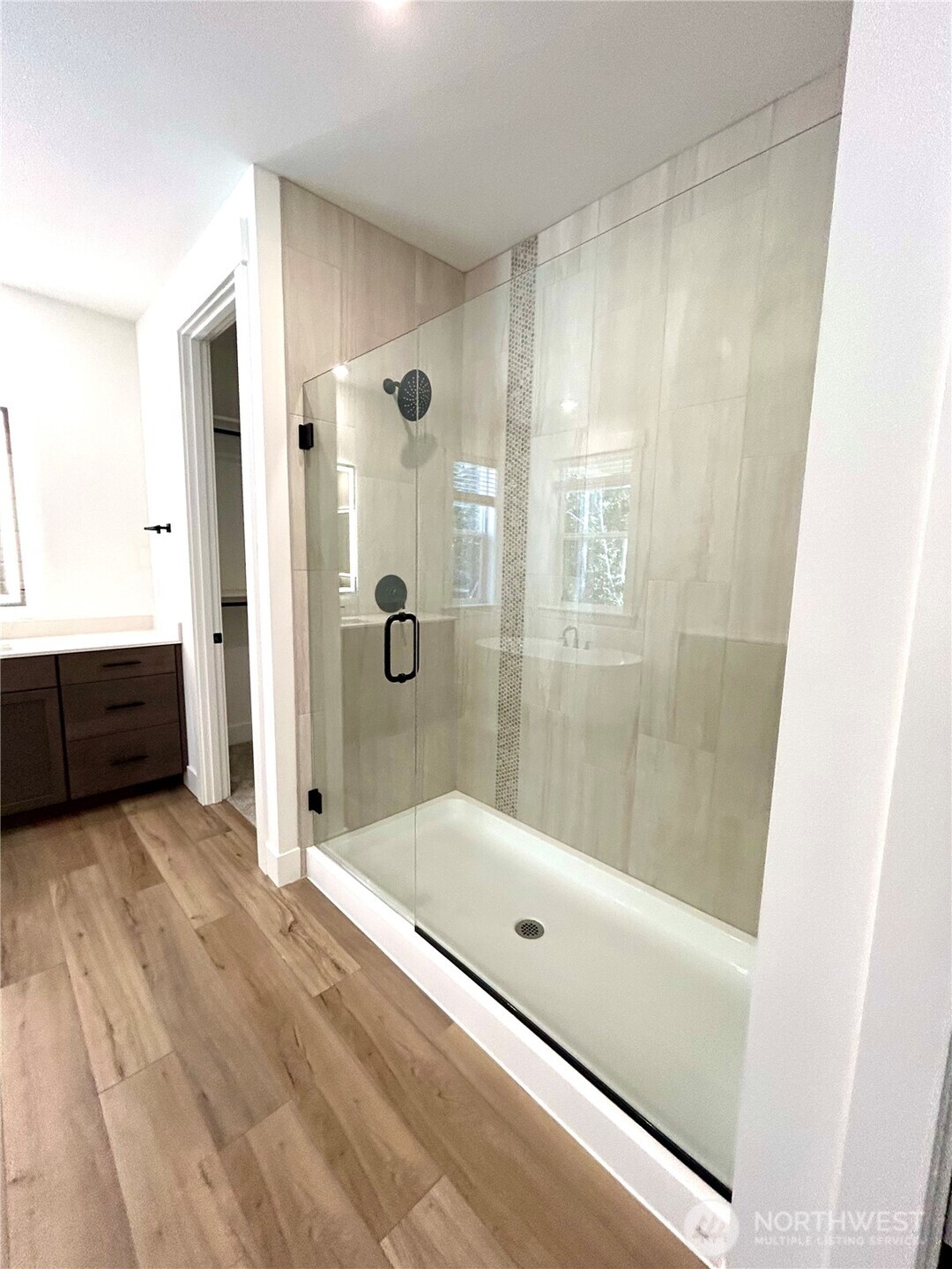 6034 Trce Drive Southwest Port Orchard, WA 98367 - Photo 26 of 40 a bathroom with a tub and shower