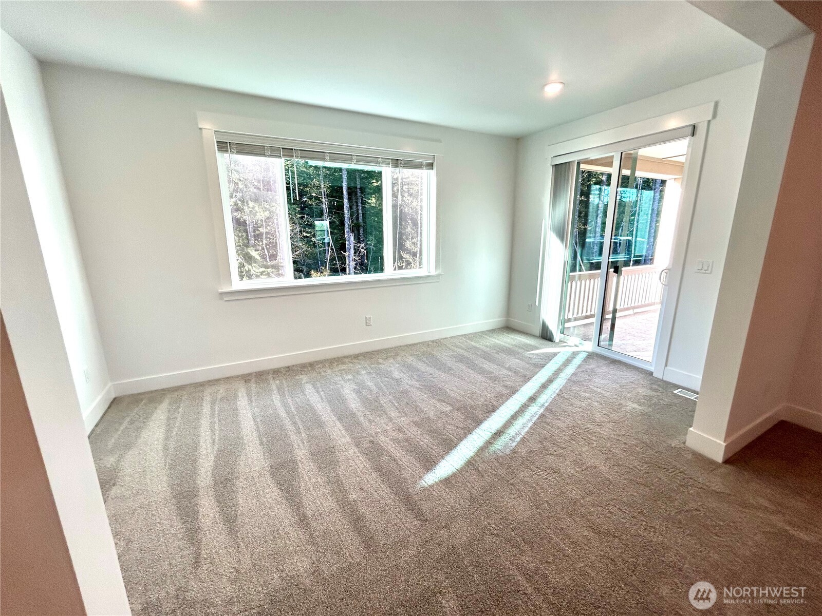 6034 Trce Drive Southwest Port Orchard, WA 98367 - Photo 27 of 40 a view of an empty room with a window