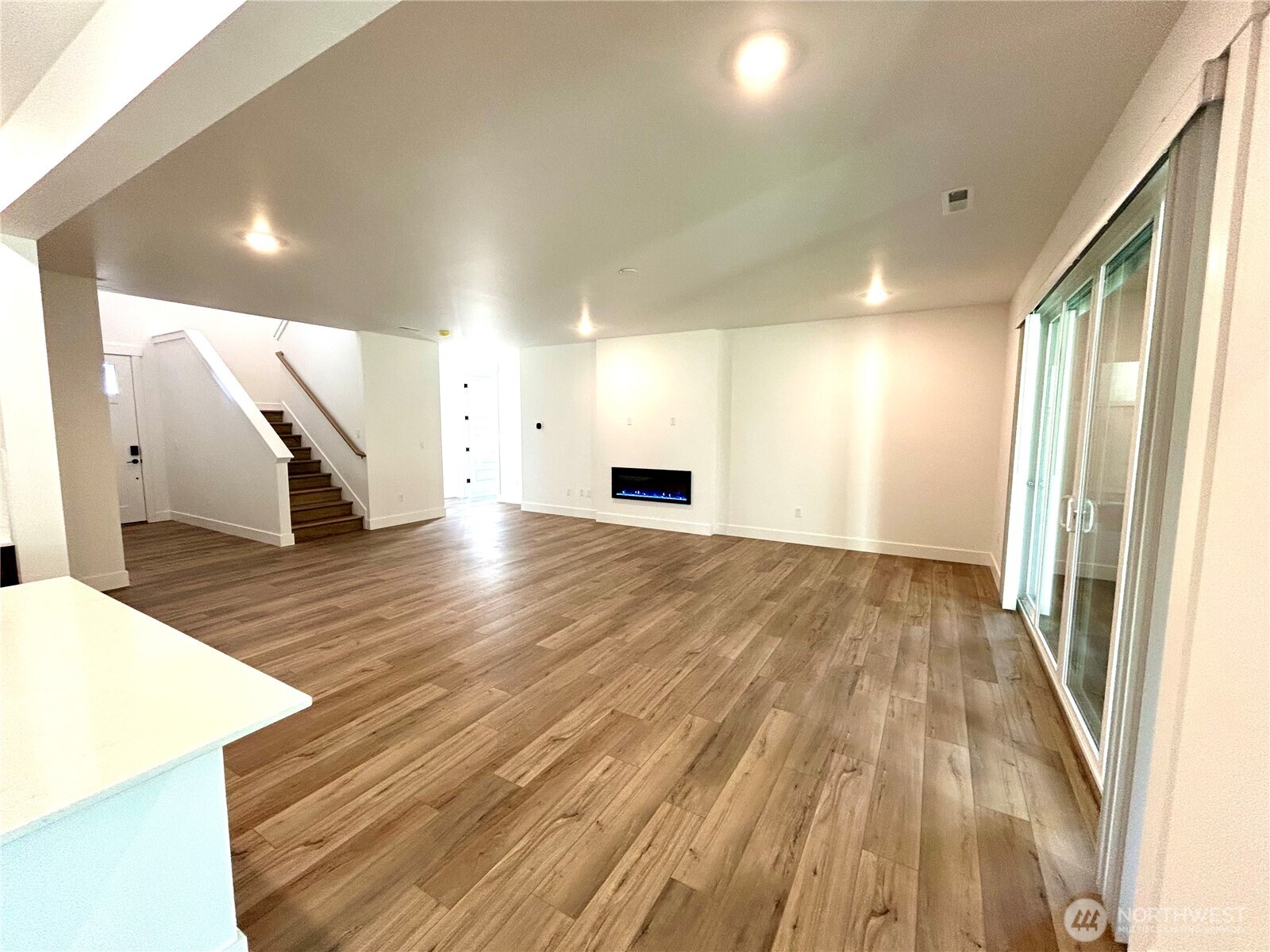 6034 Trce Drive Southwest Port Orchard, WA 98367 - Photo 3 of 40 wooden floor in an empty room with wooden floor