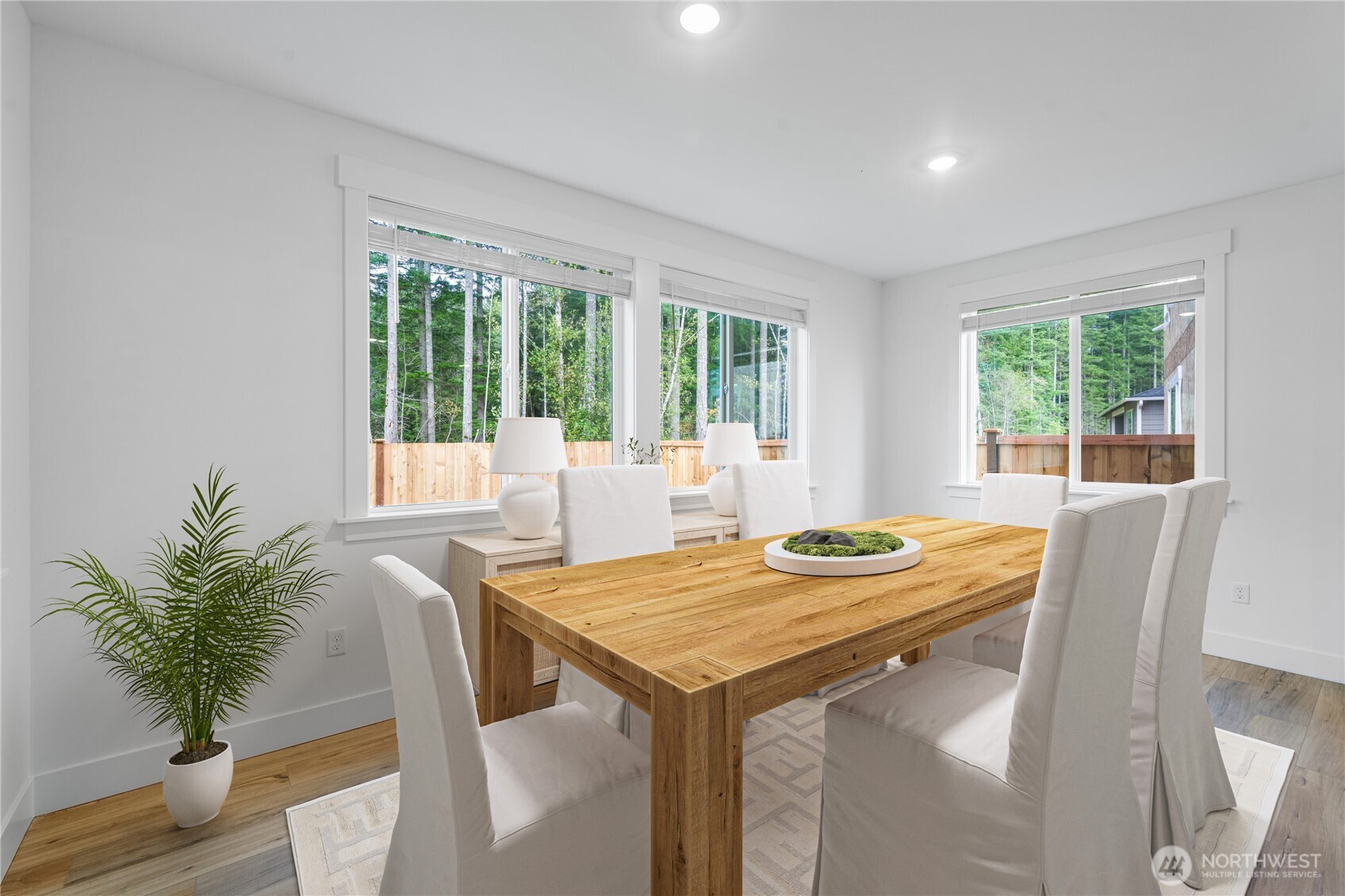 6034 Trce Drive Southwest Port Orchard, WA 98367 - Photo 8 of 40 a view of a dining room with furniture window and outside view