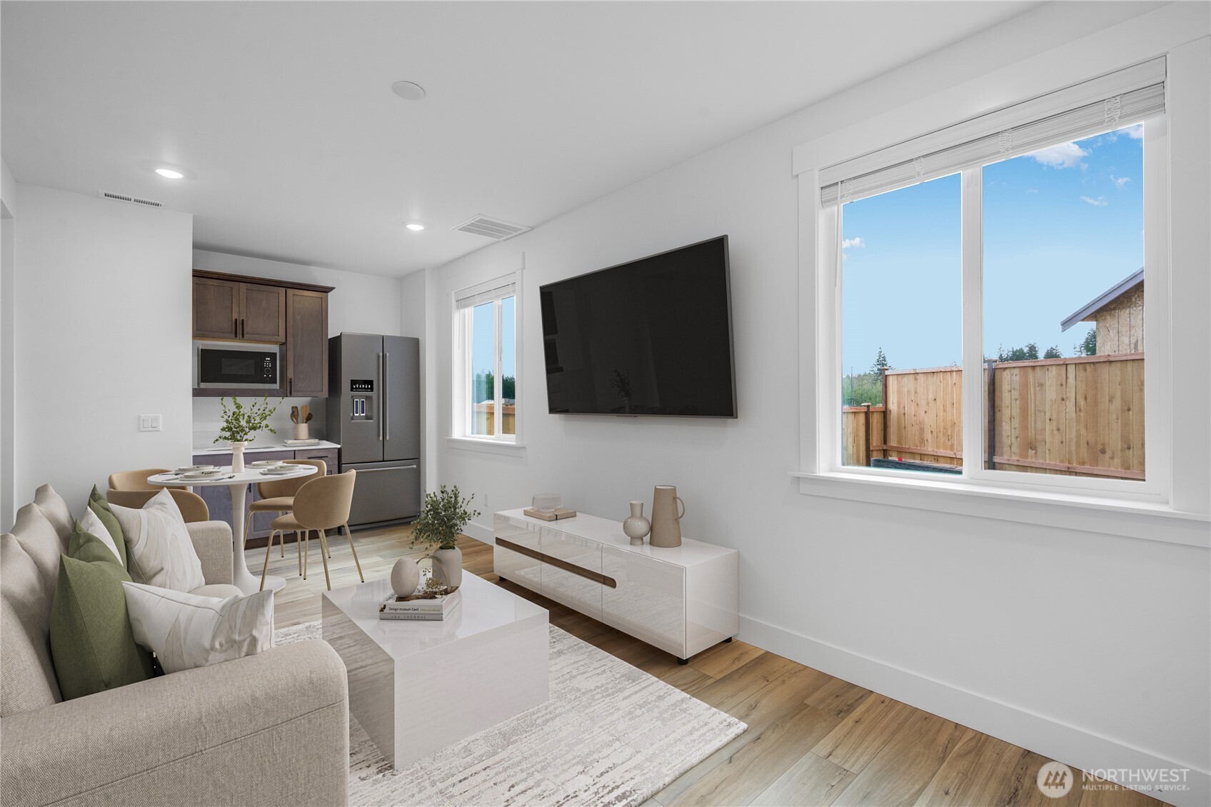 6034 Trce Drive Southwest Port Orchard, WA 98367 - Photo 10 of 40 a living room with furniture and a flat screen tv