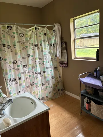 a bathroom with a sink and a tub