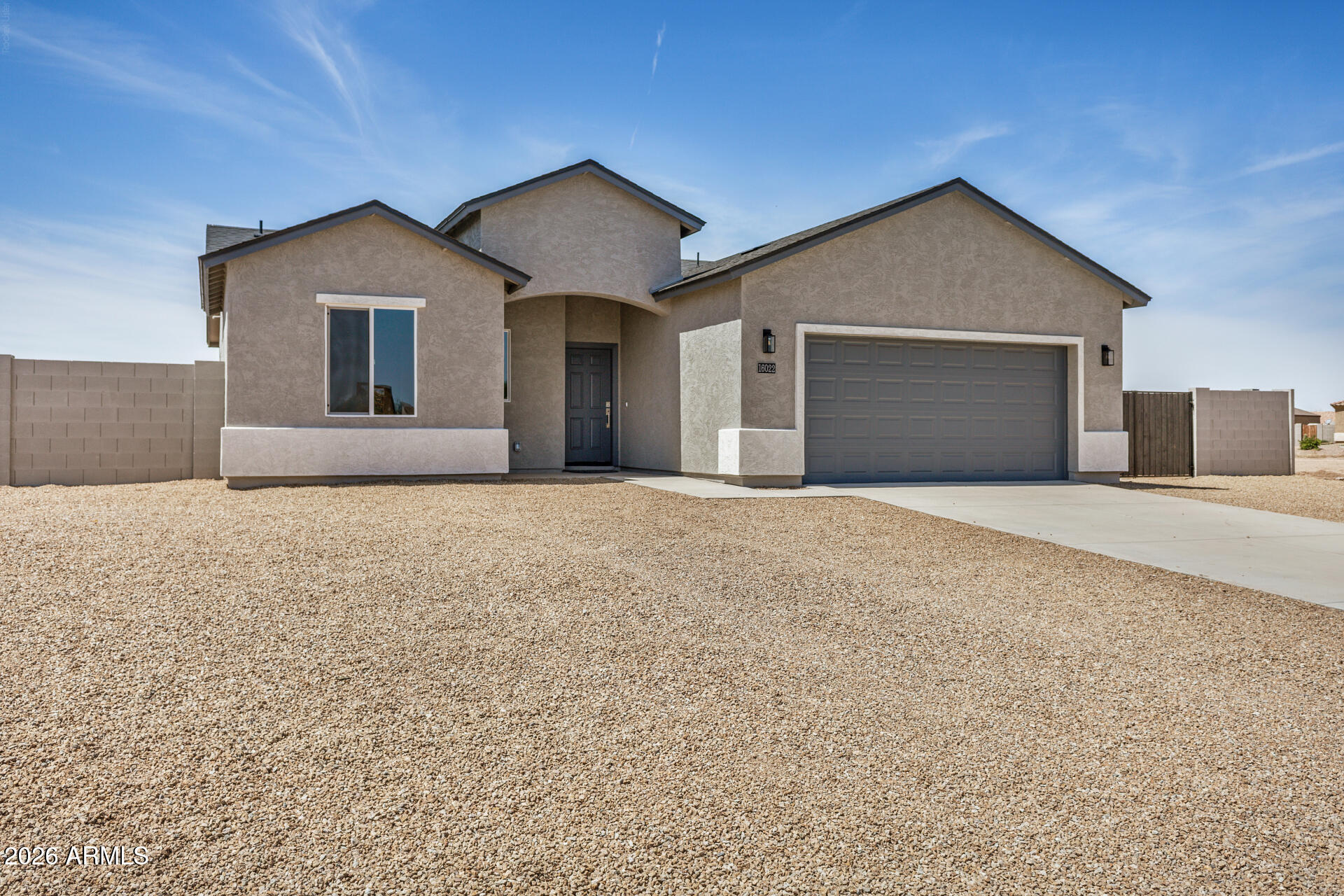 16022 South Naviska Road Arizona City, AZ 85123 - Photo 2 of 25 a front view of house with yard and garage