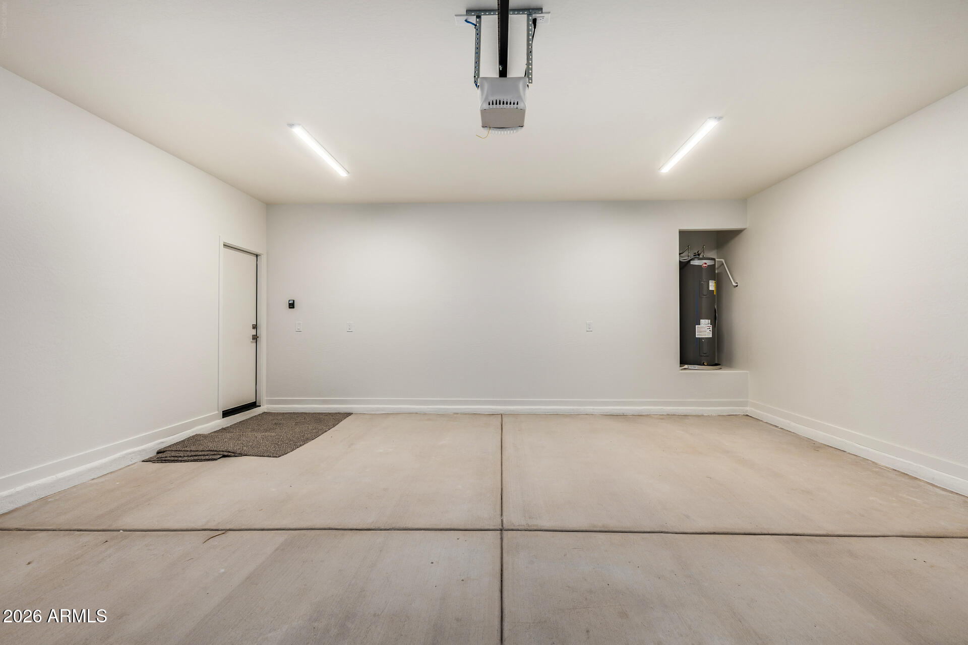 16022 South Naviska Road Arizona City, AZ 85123 - Photo 21 of 25 an empty room with a empty space and windows