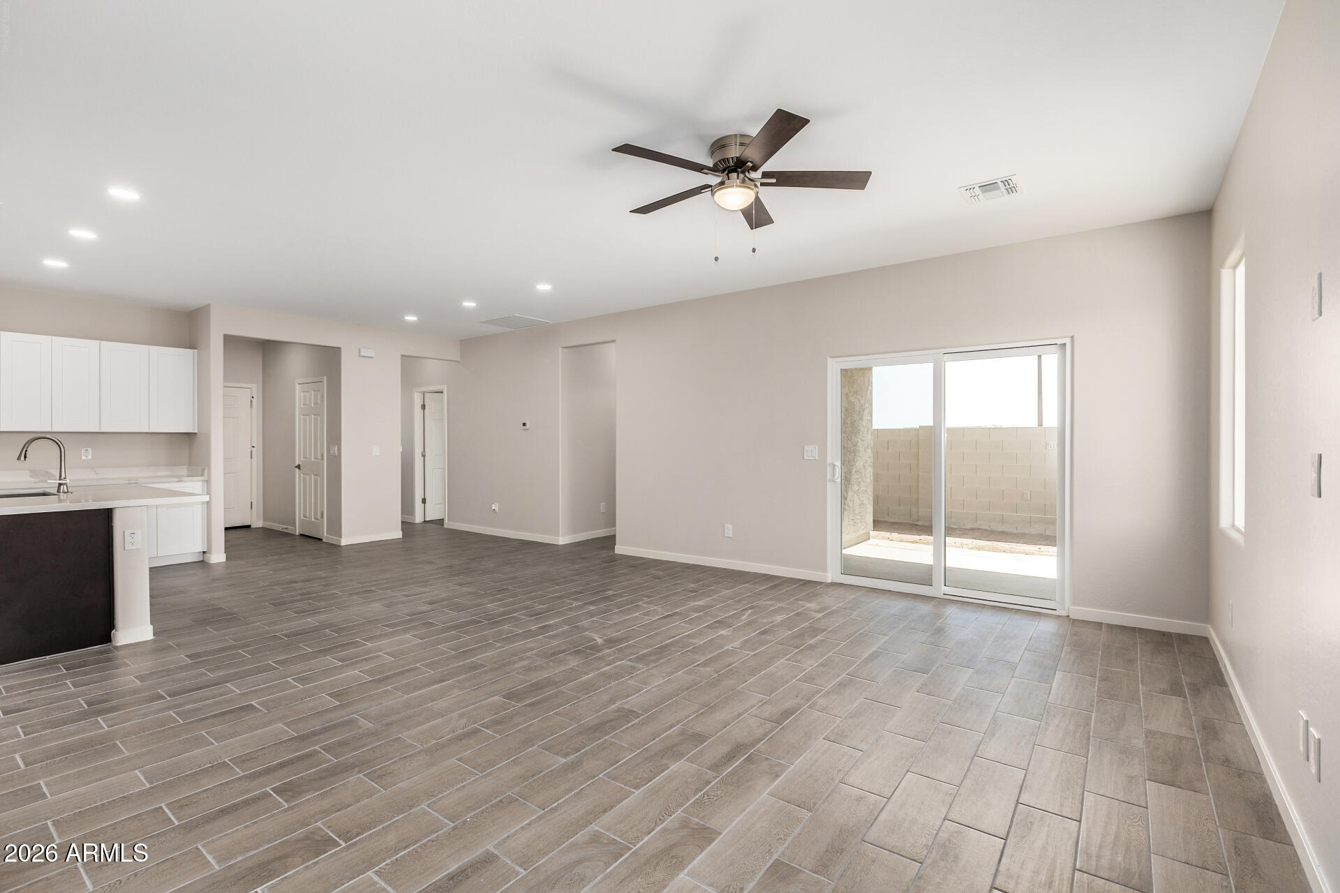 16022 South Naviska Road Arizona City, AZ 85123 - Photo 5 of 25 a view of an empty room with a window