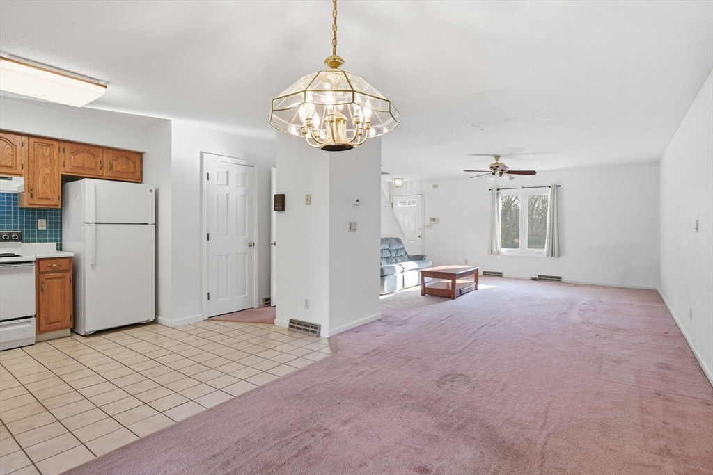 200 Lambert Terrace, Unit 70 Chicopee, MA 01020 - Photo 11 of 39 a view of a livingroom with a kitchen