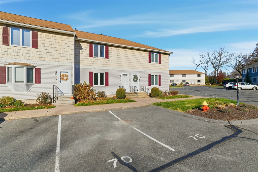 200 Lambert Terrace, Unit 70 Chicopee, MA 01020 - Photo 2 of 39 a view of a white house with a outdoor space
