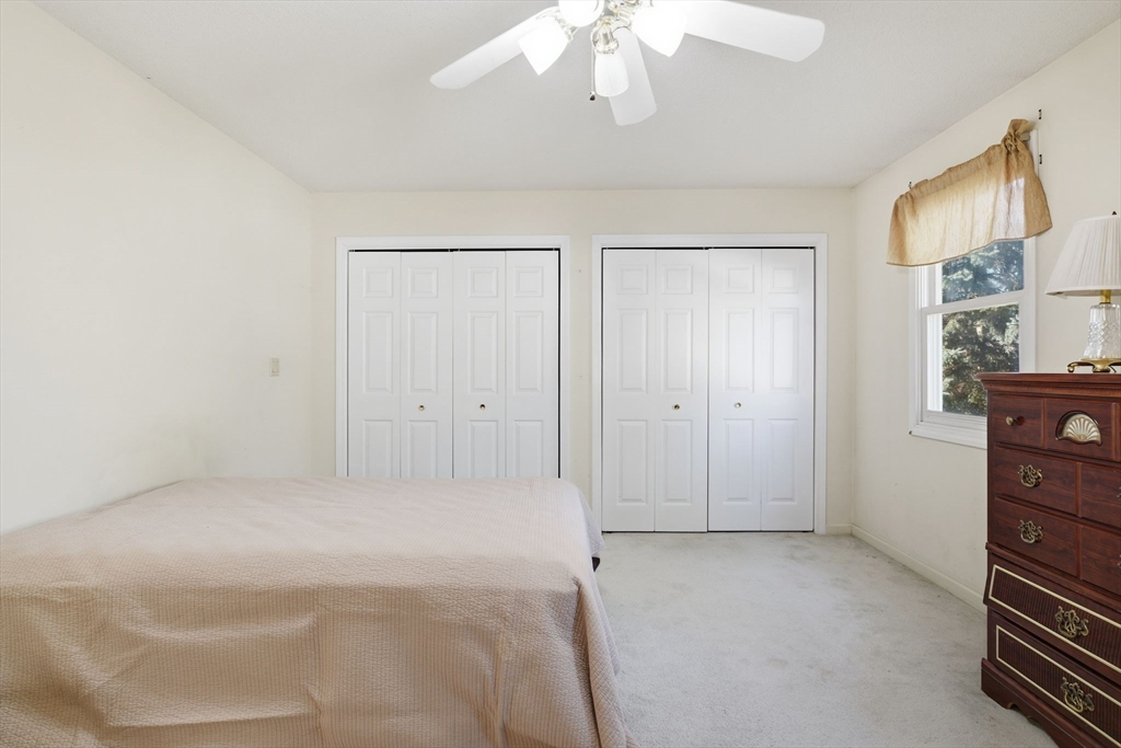 200 Lambert Terrace, Unit 70 Chicopee, MA 01020 - Photo 21 of 39 a view of an empty room with a fireplace