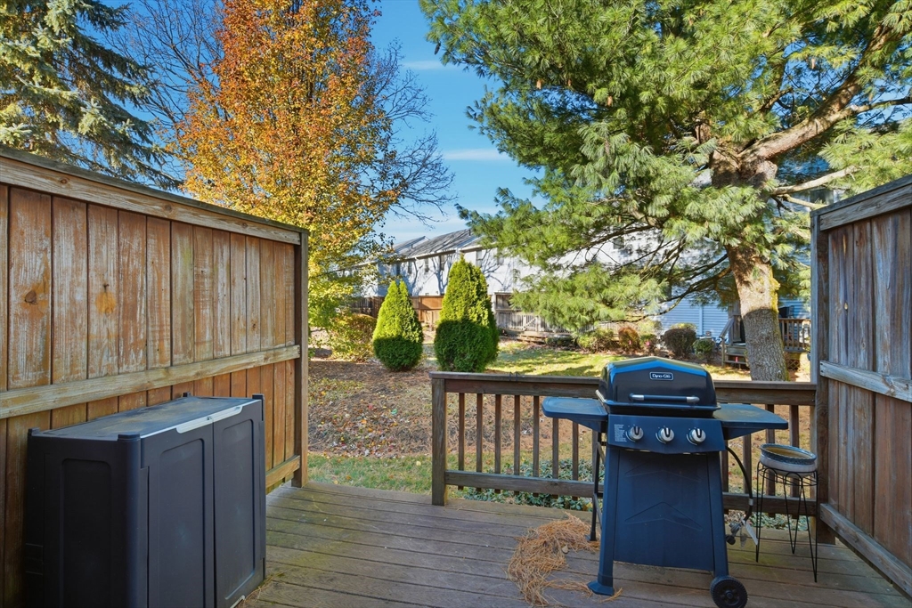 200 Lambert Terrace, Unit 70 Chicopee, MA 01020 - Photo 35 of 39 a view of a chairs and table in the patio