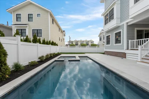 a view of a house with a swimming pool