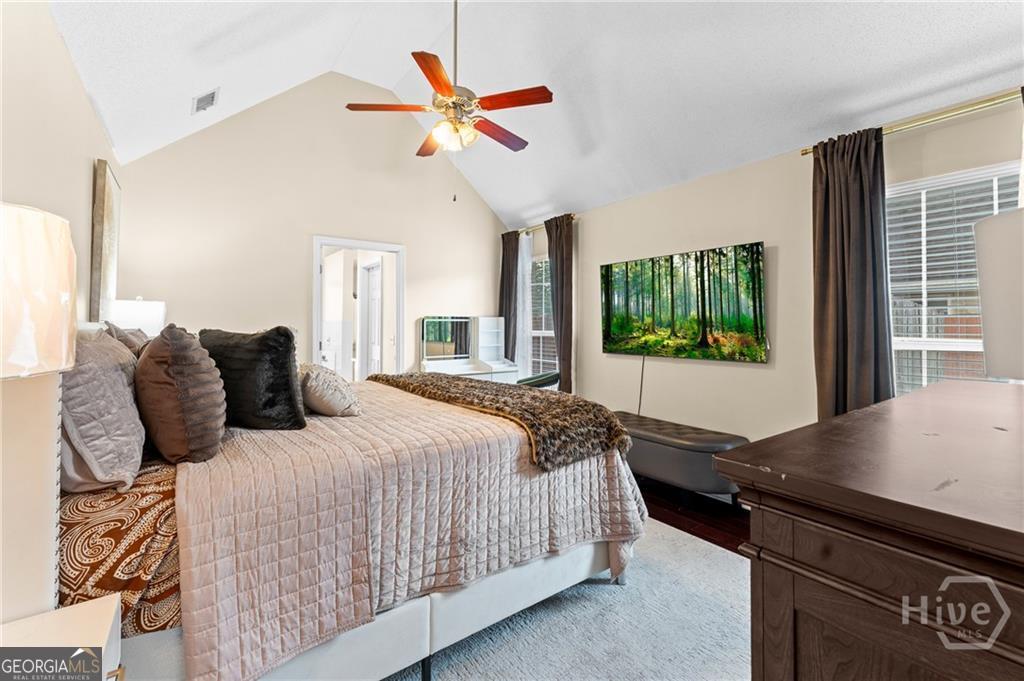 10 Fox Hound Court Pooler, GA 31322 - Photo 22 of 32 a bedroom with a bed and a large window