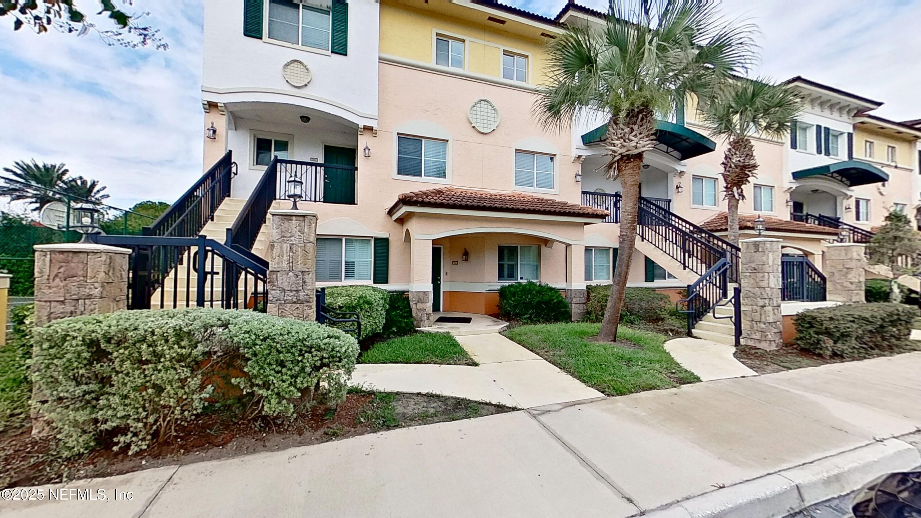 9745 Touchton Road, Unit 1421 Jacksonville, FL 32246 - Photo 1 of 22 a front view of a house with a yard